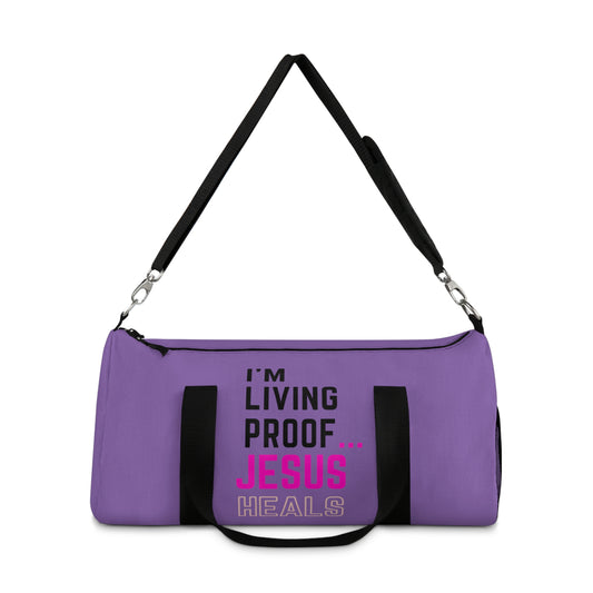 I'm living proof...Jesus Heals - Duffel Bag (purple)