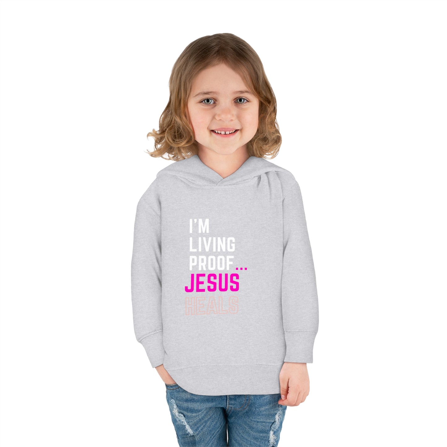 I'm living proof...Jesus Heals- Toddler Pullover Hoodie (pink letters)