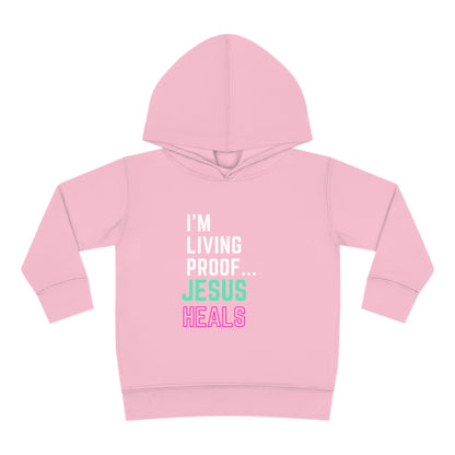 I'm living proof...Jesus Heals- Toddler Pullover Hoodie (pink & blue letters)